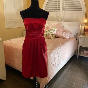 Red,strapless, satin size 5/6 dress by David’s Bridal.